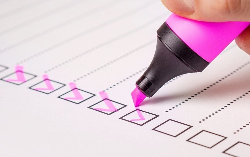 Highlighting a checklist with a pink highlighter